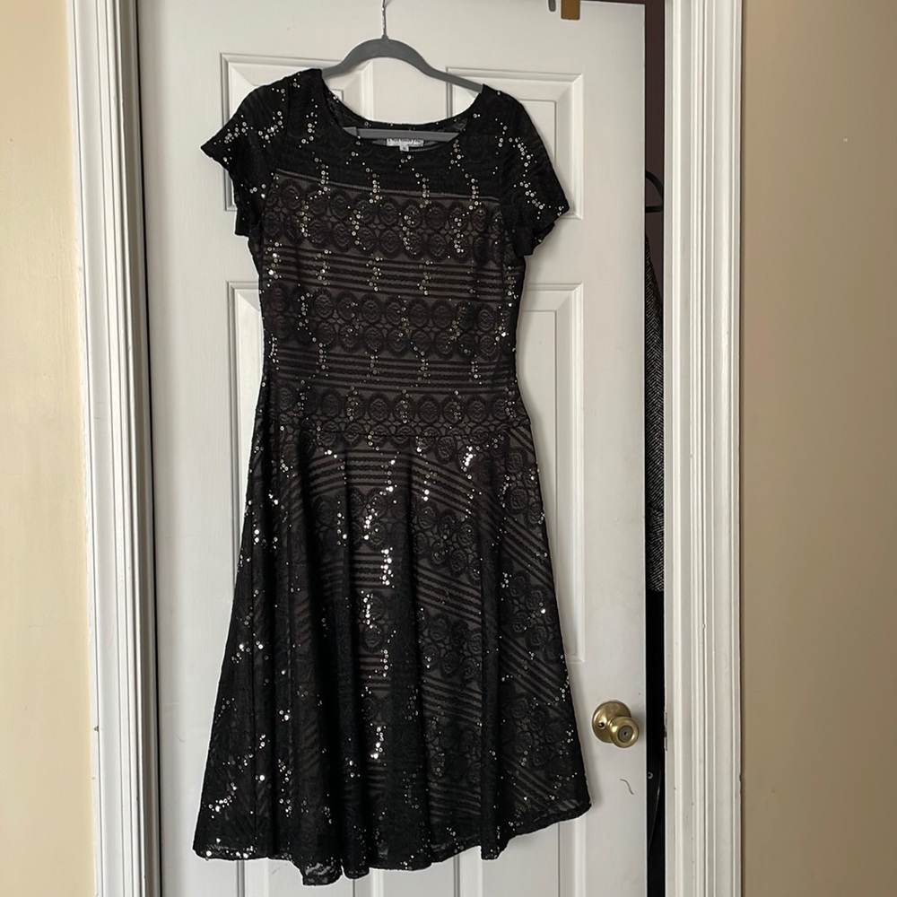 Used black ladies semi formal dress Size 10